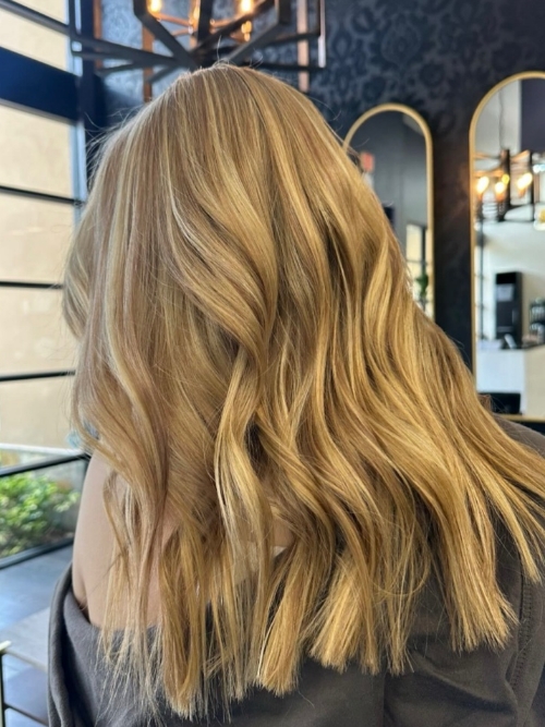 woman's hair with blonde curls